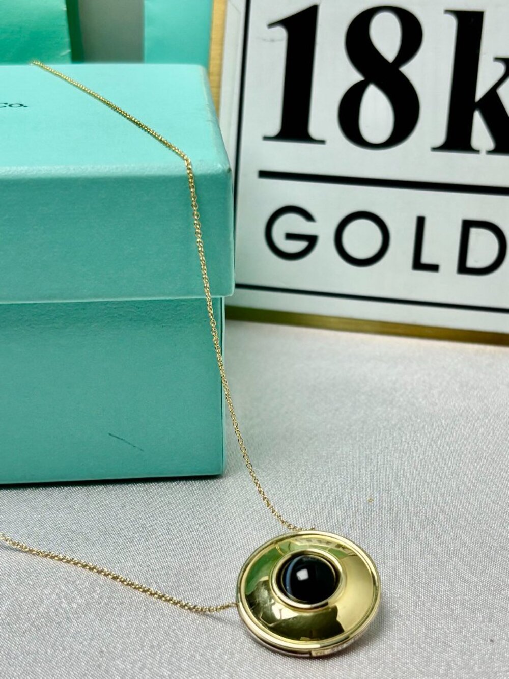 Tiffany & Co. reversible Paloma Picasso Magic Pendant and chain in18ky/silver